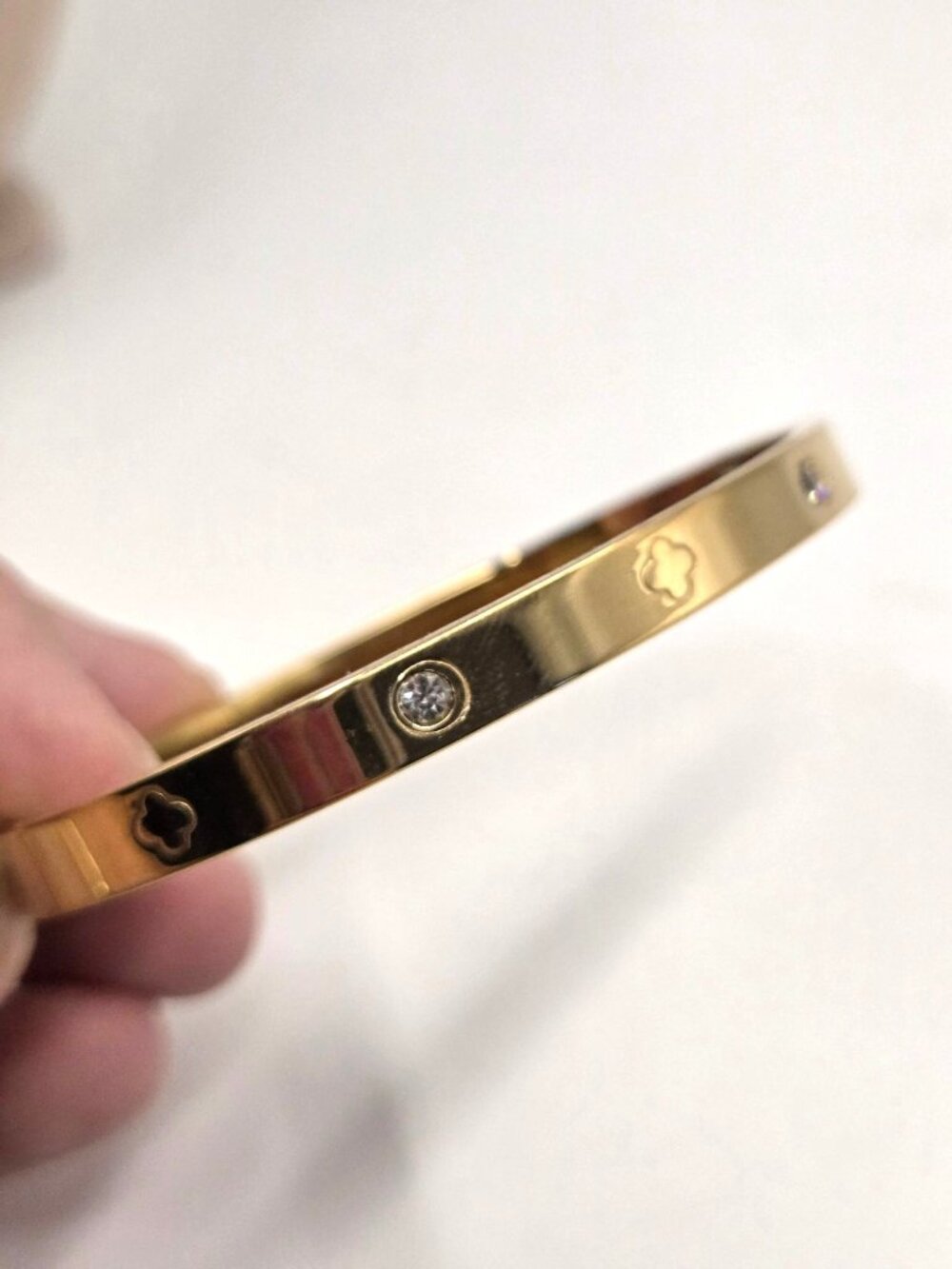 Gold-Tone Bangle Bracelet With Crystal Accents & Clover Cut-Out Design